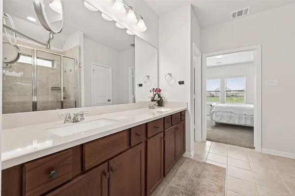 a view of a garden with a large trees