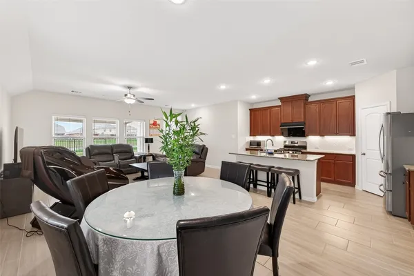 a view of a dining room with furniture