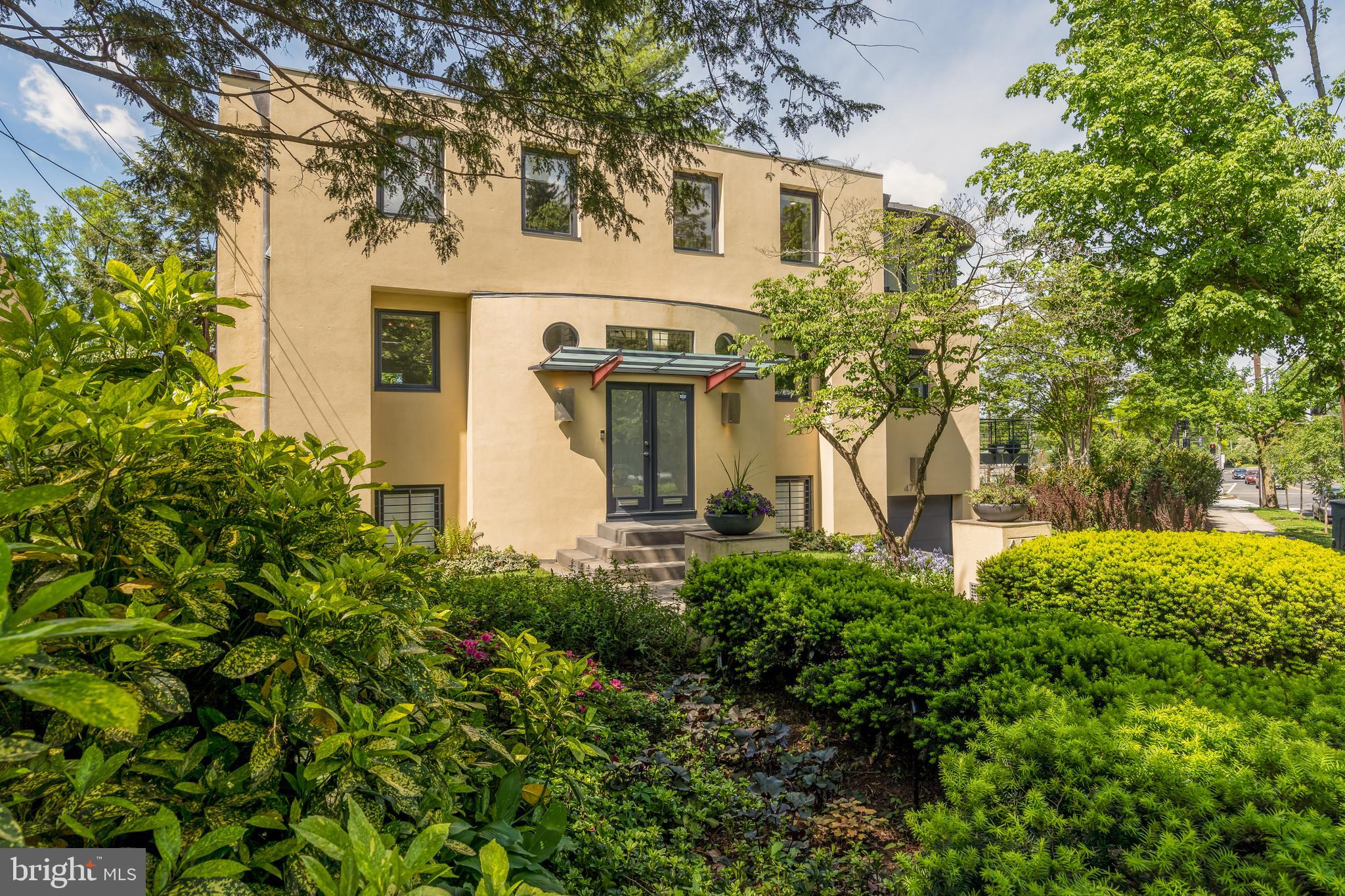 4770 Reservoir Road Northwest Washington, DC 20007 - Photo 2 of 50 Front photo with lush landscaping