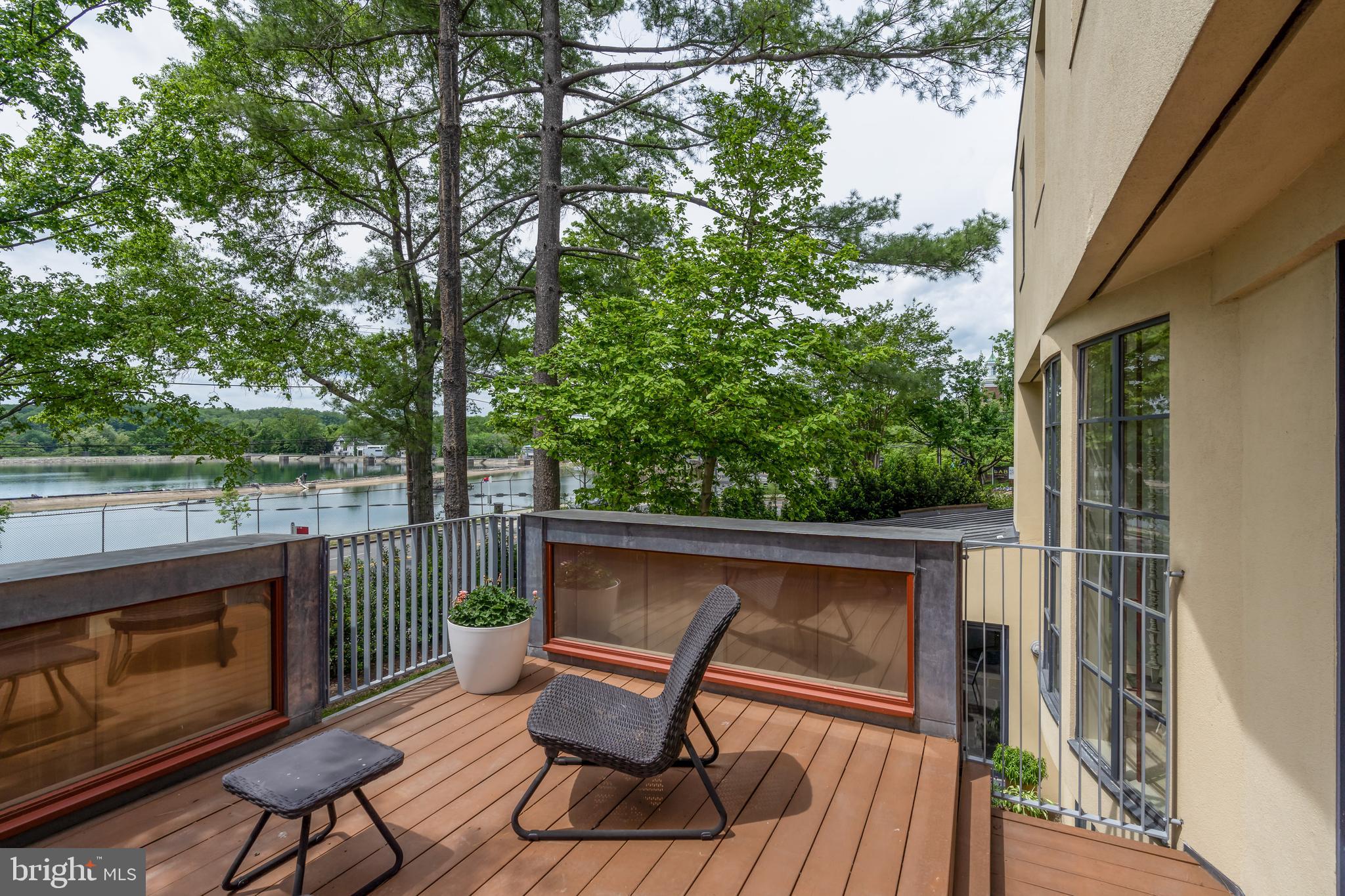 4770 Reservoir Road Northwest Washington, DC 20007 - Photo 11 of 50 Deck off living area with water views of Reservoir