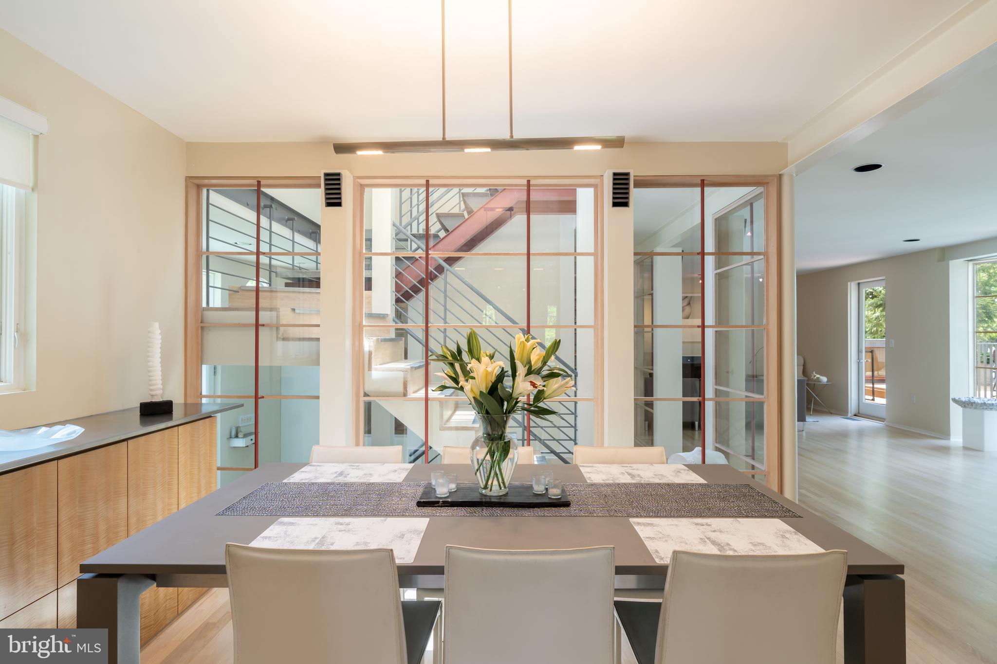 4770 Reservoir Road Northwest Washington, DC 20007 - Photo 16 of 50 Dining room with view of fabulous steel staircase