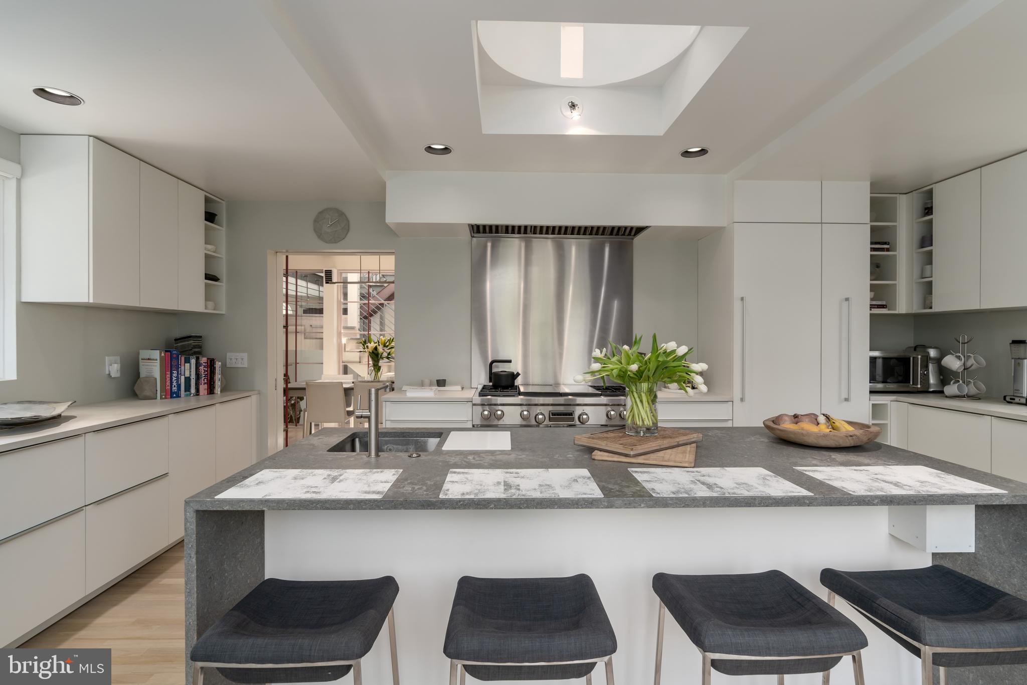 4770 Reservoir Road Northwest Washington, DC 20007 - Photo 19 of 50 Cesar stone kitchen island facing the chef