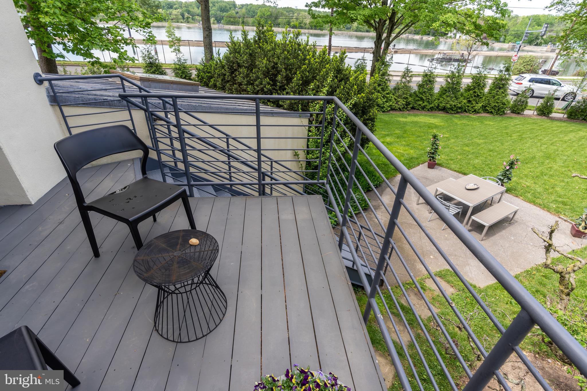 4770 Reservoir Road Northwest Washington, DC 20007 - Photo 21 of 50 Recent trex deck with water views & patio below
