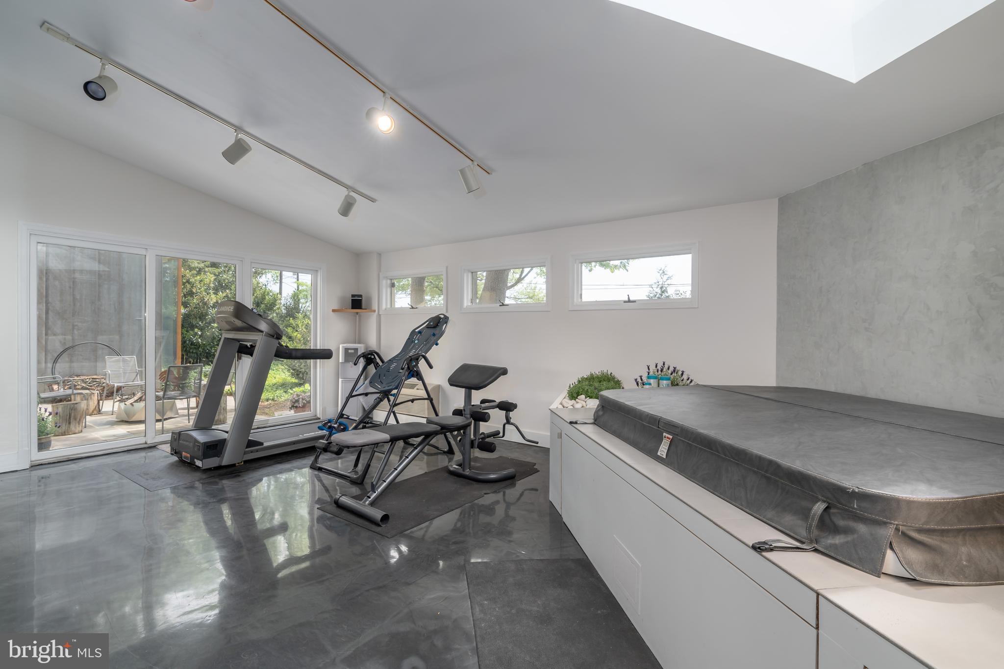 4770 Reservoir Road Northwest Washington, DC 20007 - Photo 43 of 50 Workout space and hot tub, sliding doors to patio