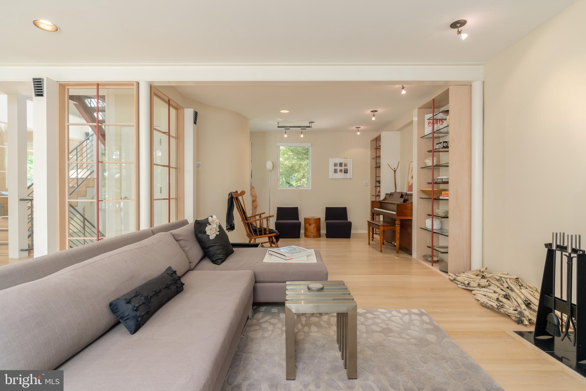 4770 Reservoir Road Northwest Washington, DC 20007 - Photo 9 of 50 Open living space with built in glass display area