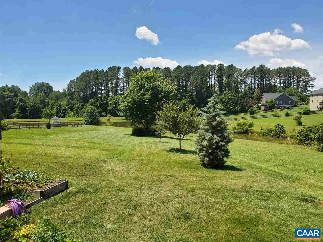 139 Wexford Ridge Road Ruckersville, VA 22968 - Photo 11 of 45 a view of a field with a tree in the background