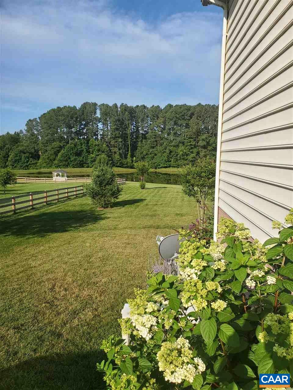 139 Wexford Ridge Road Ruckersville, VA 22968 - Photo 13 of 45 a view of a lake with a mountain