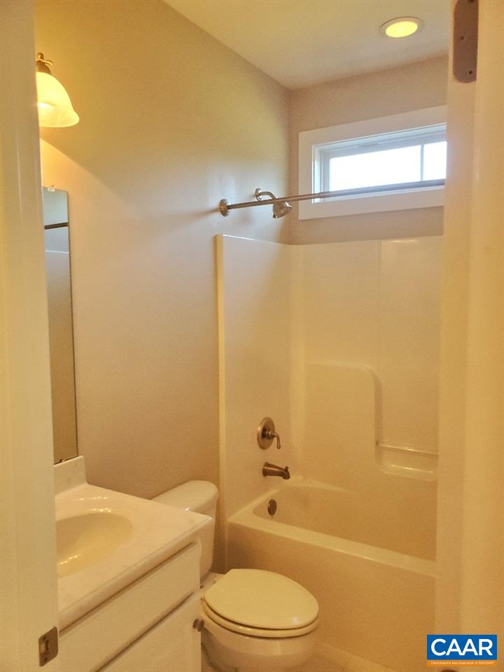 139 Wexford Ridge Road Ruckersville, VA 22968 - Photo 28 of 45 a bathroom with a bathtub shower sink vanity and toilet