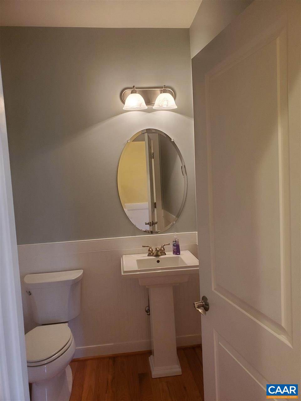 139 Wexford Ridge Road Ruckersville, VA 22968 - Photo 29 of 45 a bathroom with a sink mirror and toilet