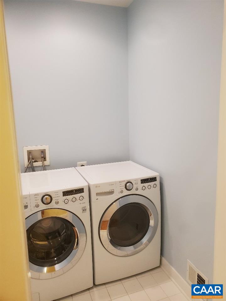 139 Wexford Ridge Road Ruckersville, VA 22968 - Photo 30 of 45 a utility room with dryer and washer
