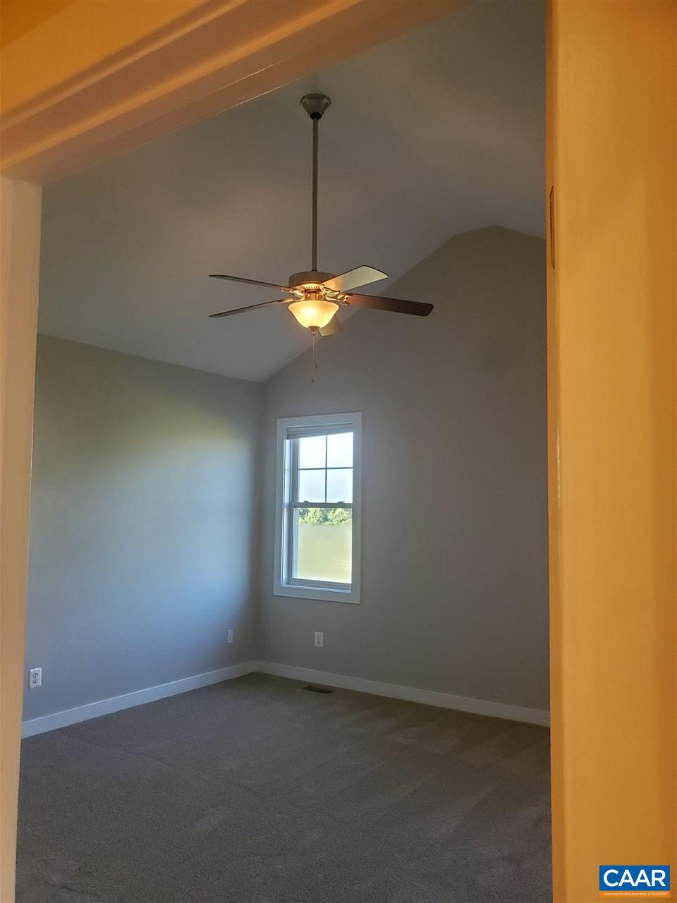139 Wexford Ridge Road Ruckersville, VA 22968 - Photo 31 of 45 a view of an empty room with a window