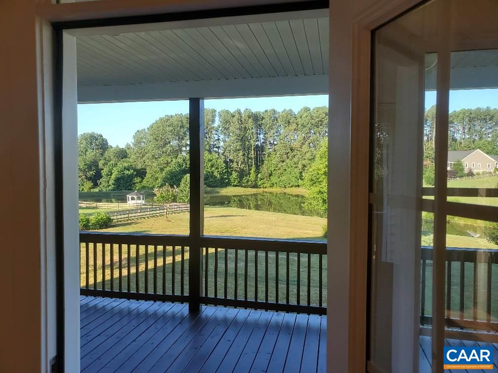 139 Wexford Ridge Road Ruckersville, VA 22968 - Photo 43 of 45 a view of a room with wooden floor and a window