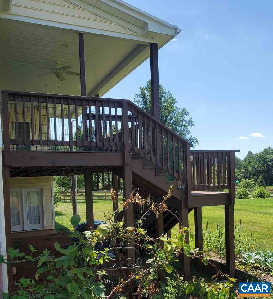 139 Wexford Ridge Road Ruckersville, VA 22968 - Photo 10 of 45 a view of a backyard with plants and garden