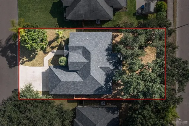 an aerial view of house with yard
