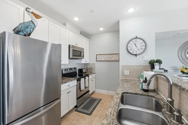 $410,000 | 4221 Grassy Pointe Drive, Unit 202, Galveston, TX 77554