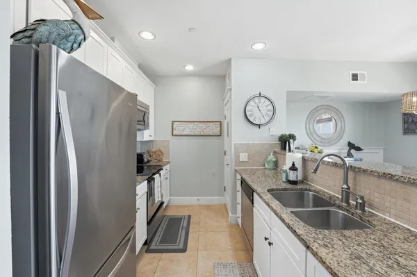 $410,000 | 4221 Grassy Pointe Drive, Unit 202, Galveston, TX 77554