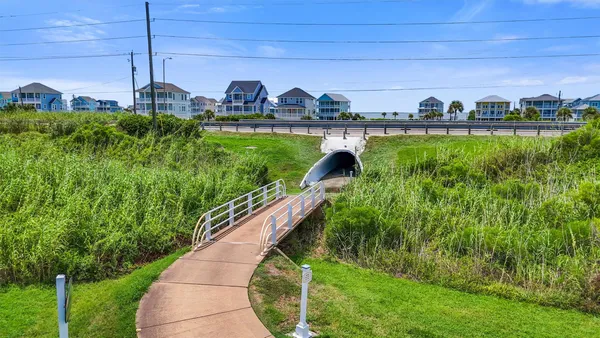$410,000 | 4221 Grassy Pointe Drive, Unit 202, Galveston, TX 77554