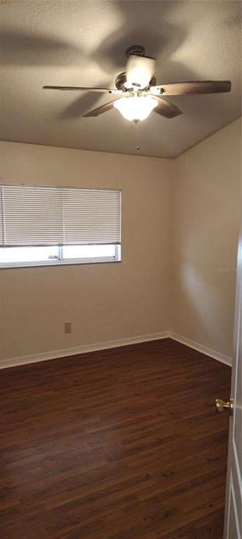210 Chardonnay Place Valrico, FL 33594 - Photo 13 of 26 a view of an empty room with wooden floor