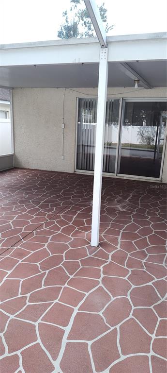 210 Chardonnay Place Valrico, FL 33594 - Photo 25 of 26 a view of a yard with a garage