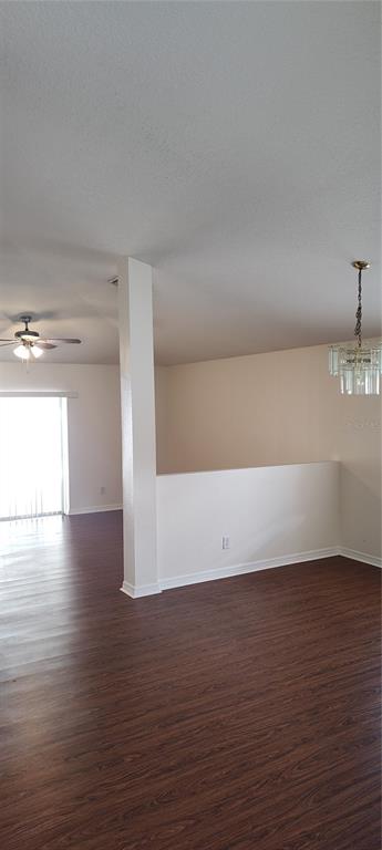 210 Chardonnay Place Valrico, FL 33594 - Photo 8 of 26 a view of empty room with wooden floor
