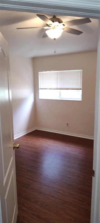 210 Chardonnay Place Valrico, FL 33594 - Photo 9 of 26 a view of empty room with wooden floor