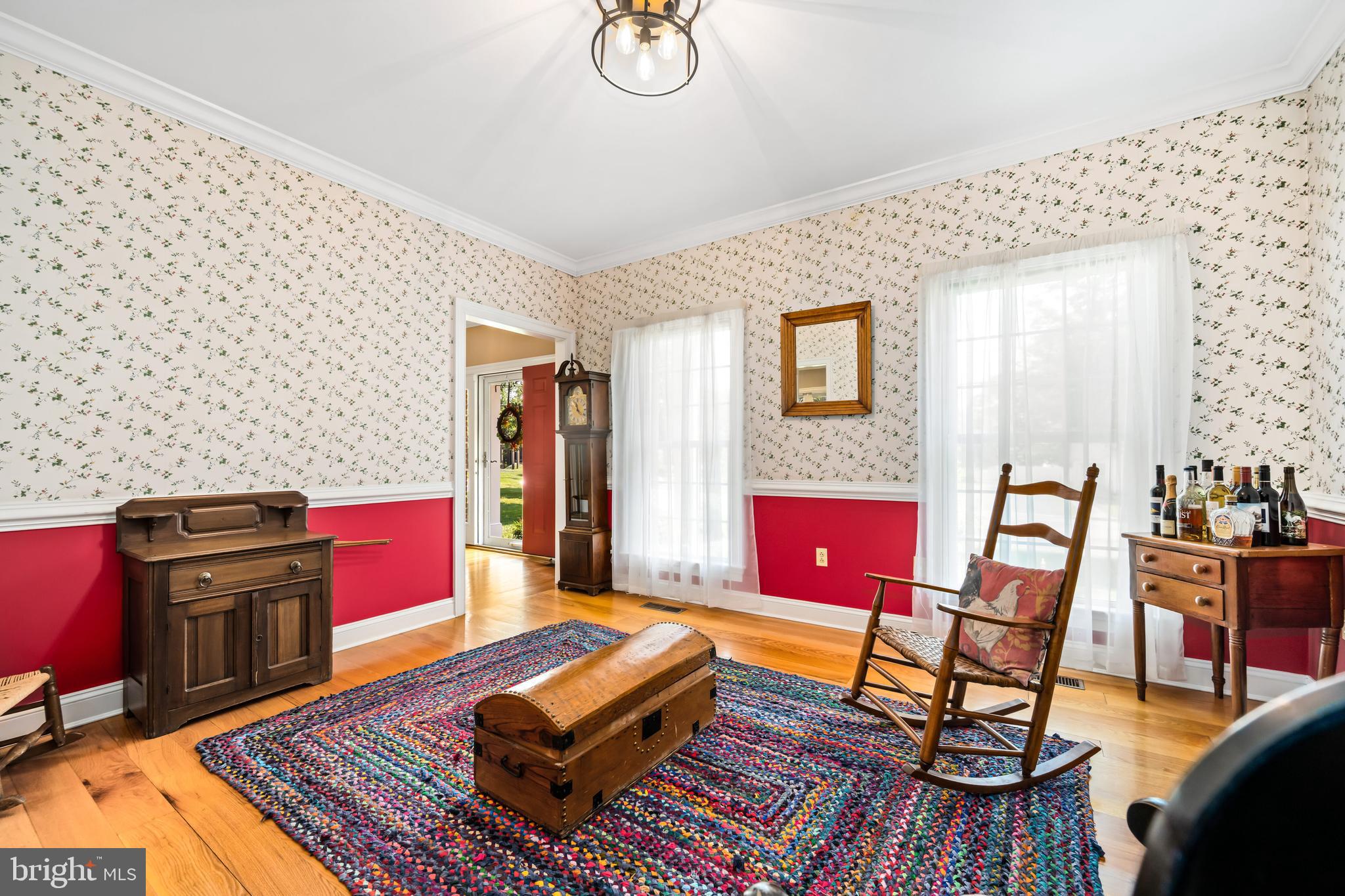 1009 South Washington Street Easton, MD 21601 - Photo 22 of 54 a living room with furniture and wooden floor