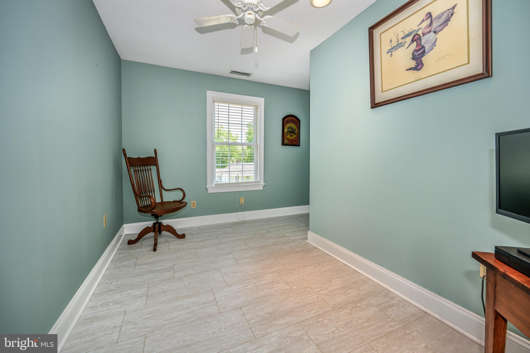1009 South Washington Street Easton, MD 21601 - Photo 34 of 54 a view of room with workspace and windows