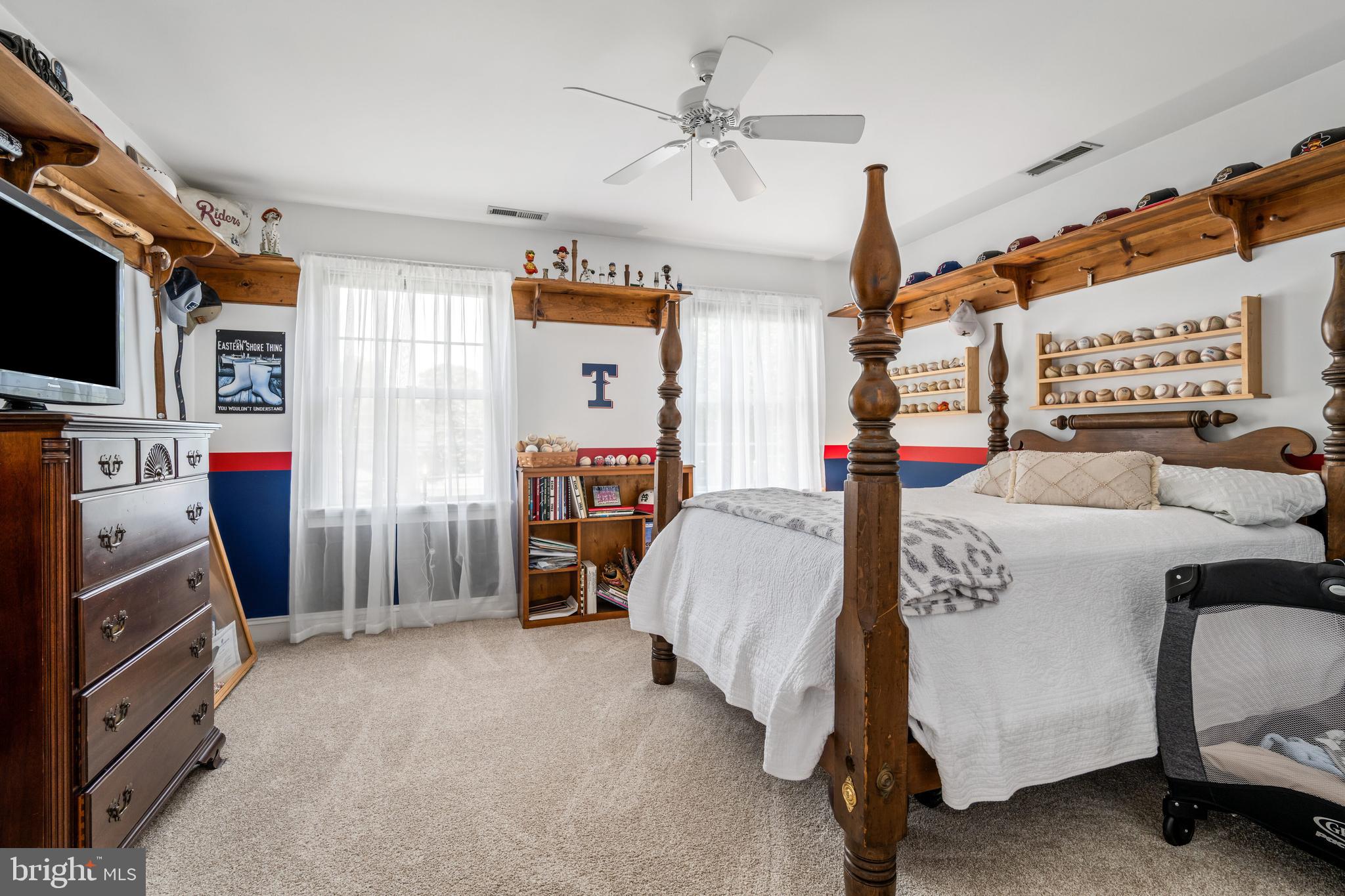 1009 South Washington Street Easton, MD 21601 - Photo 40 of 54 a bed room with a bed and a tv