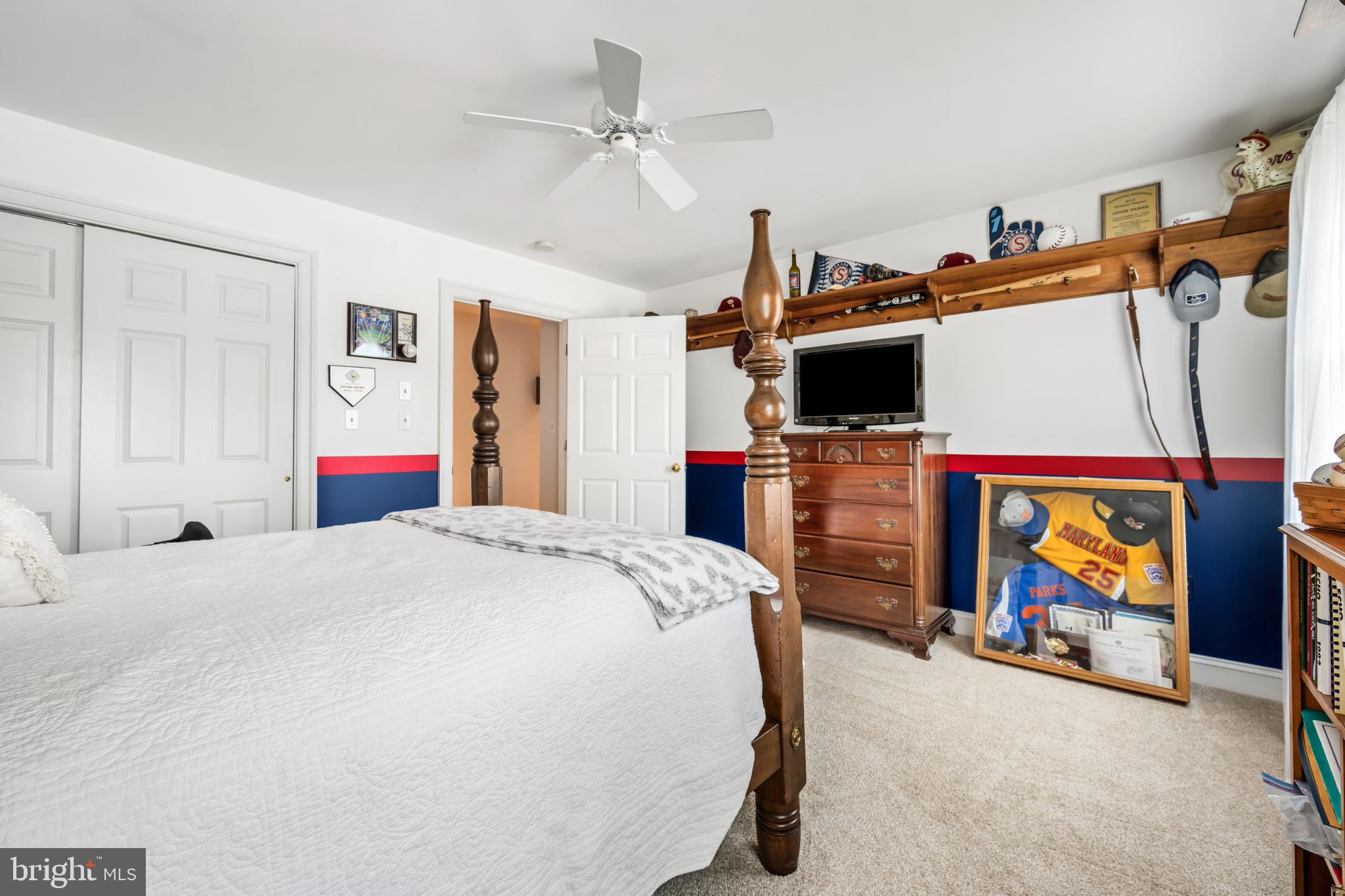 1009 South Washington Street Easton, MD 21601 - Photo 41 of 54 a bed room with a bed and a tv