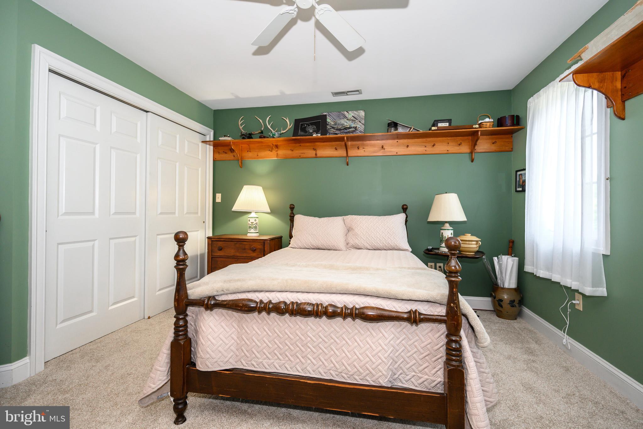 1009 South Washington Street Easton, MD 21601 - Photo 43 of 54 a bedroom with a bed and a window