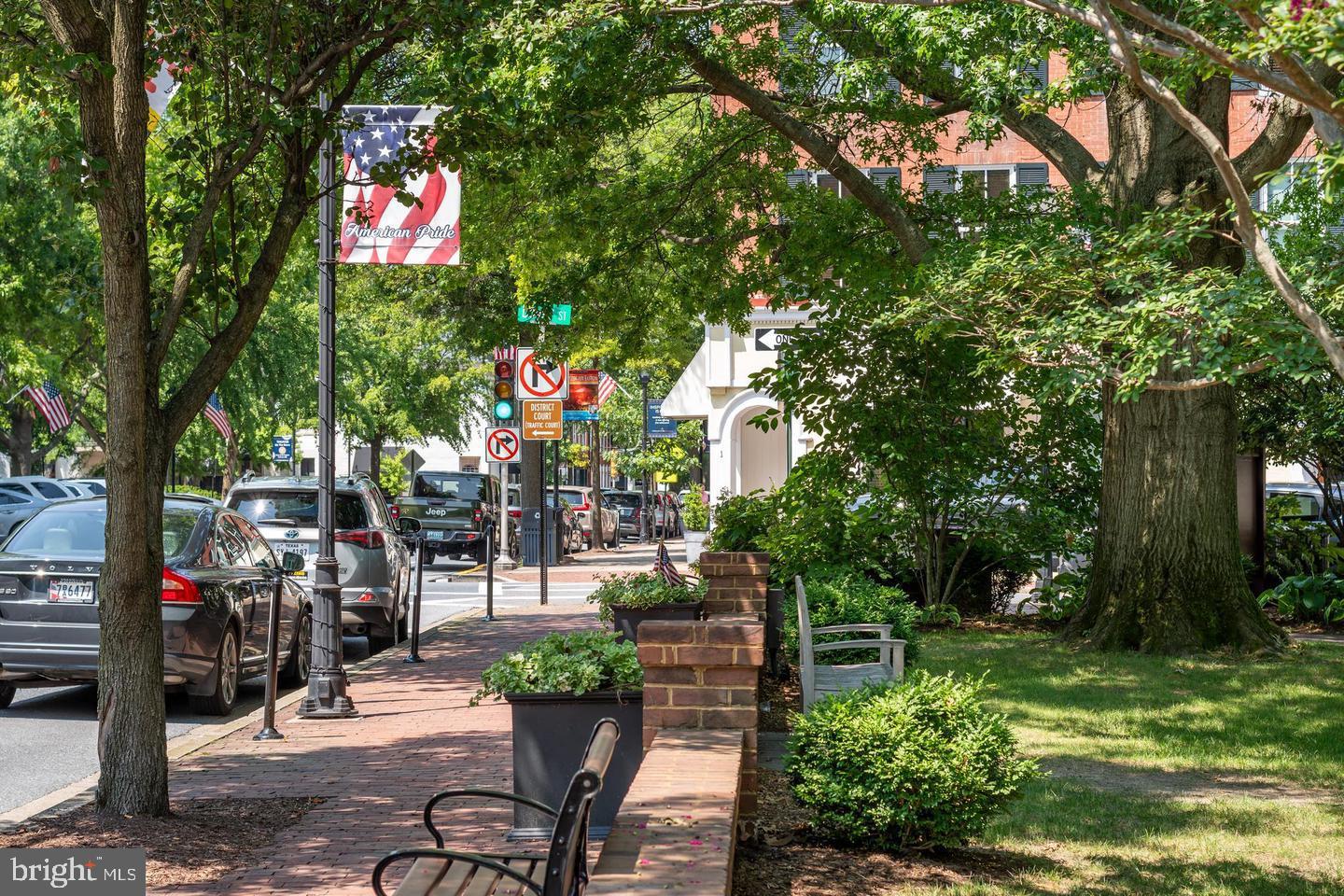 1009 South Washington Street Easton, MD 21601 - Photo 52 of 54 a sign that is on a tree in front of it