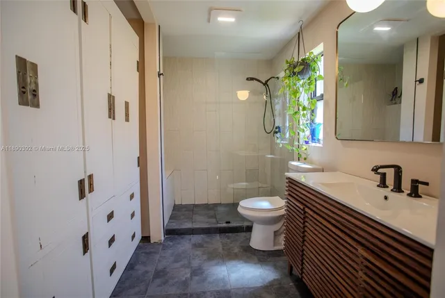 $880,000 | 10605 Southwest 132nd Court, Miami, FL 33186