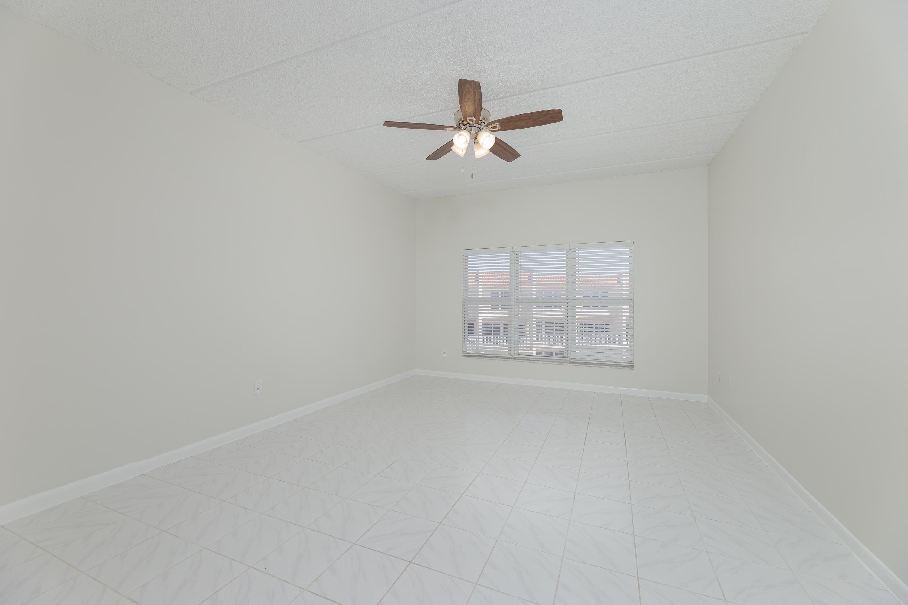 390 A1A Beach Boulevard, Unit 48 St. Augustine, FL 32080 - Photo 14 of 24 an empty room with a window