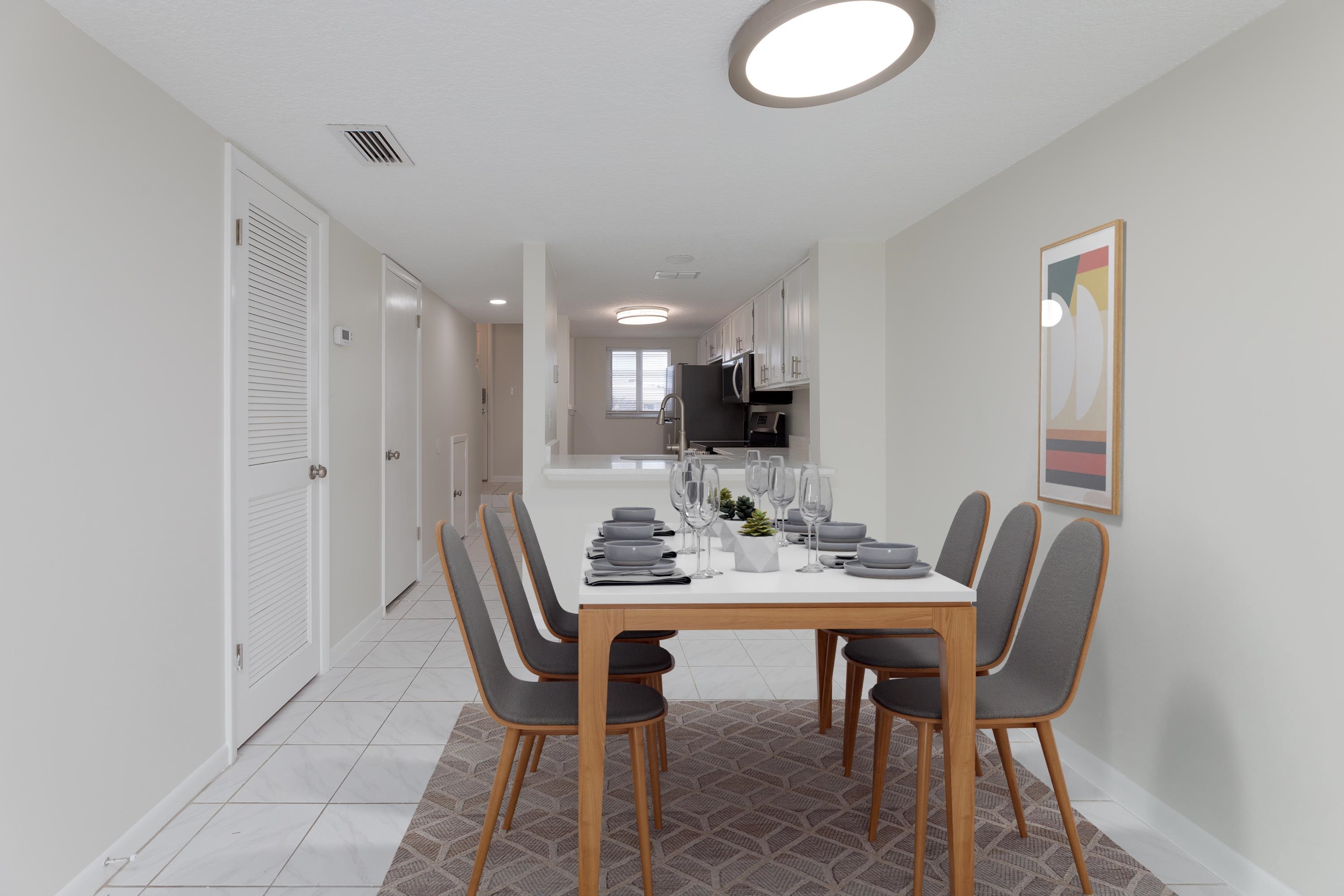 390 A1A Beach Boulevard, Unit 48 St. Augustine, FL 32080 - Photo 18 of 24 a view of a dining room with furniture