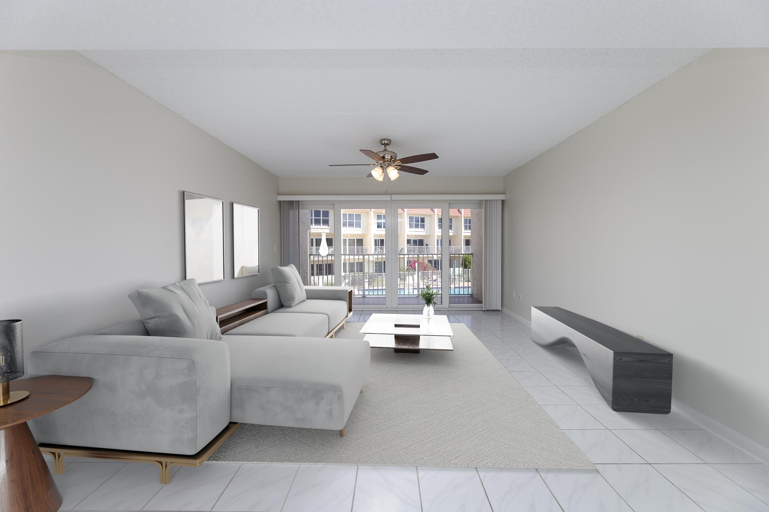 390 A1A Beach Boulevard, Unit 48 St. Augustine, FL 32080 - Photo 19 of 24 a living room with furniture and a large window