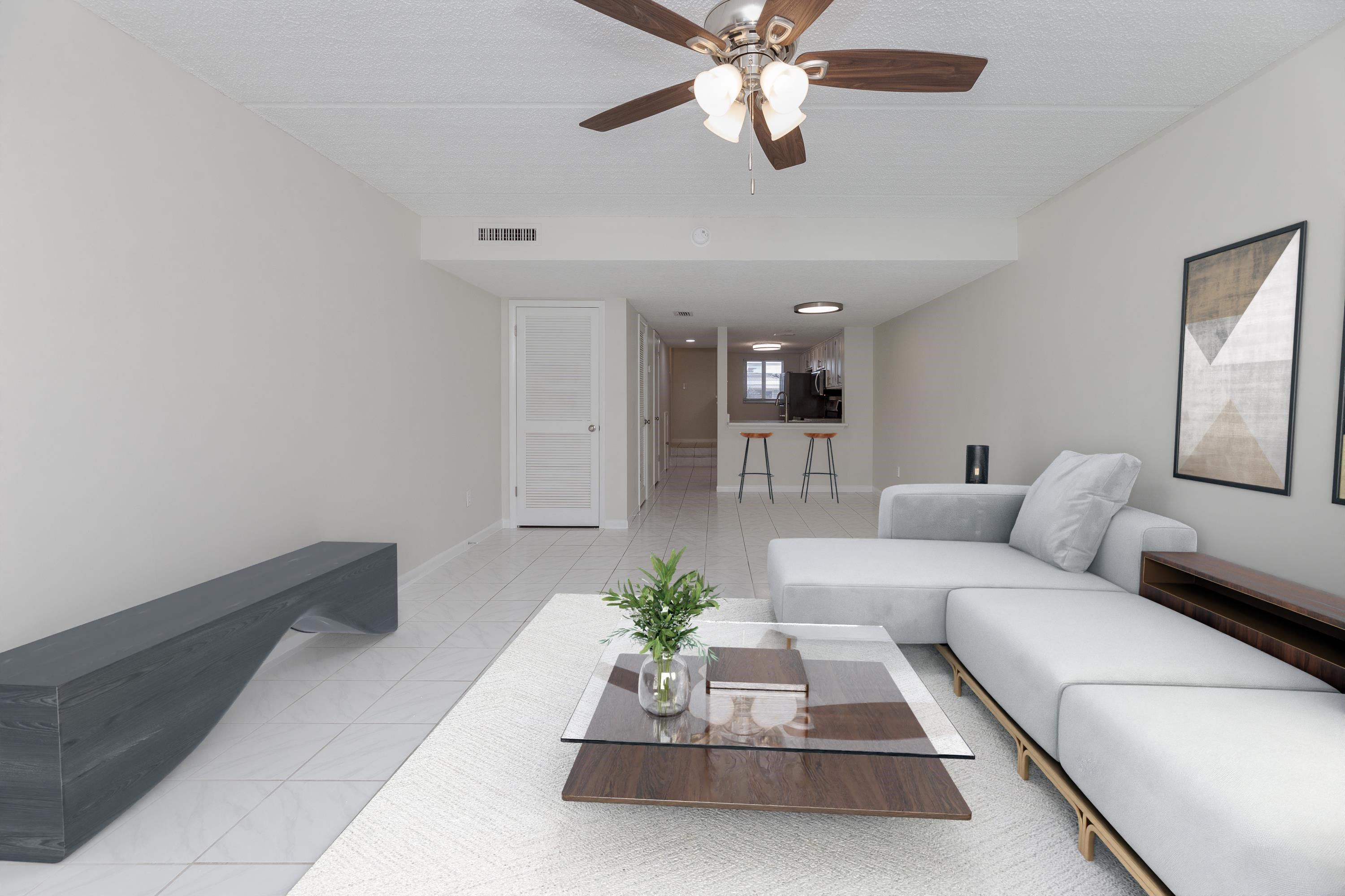 390 A1A Beach Boulevard, Unit 48 St. Augustine, FL 32080 - Photo 20 of 24 a living room with furniture