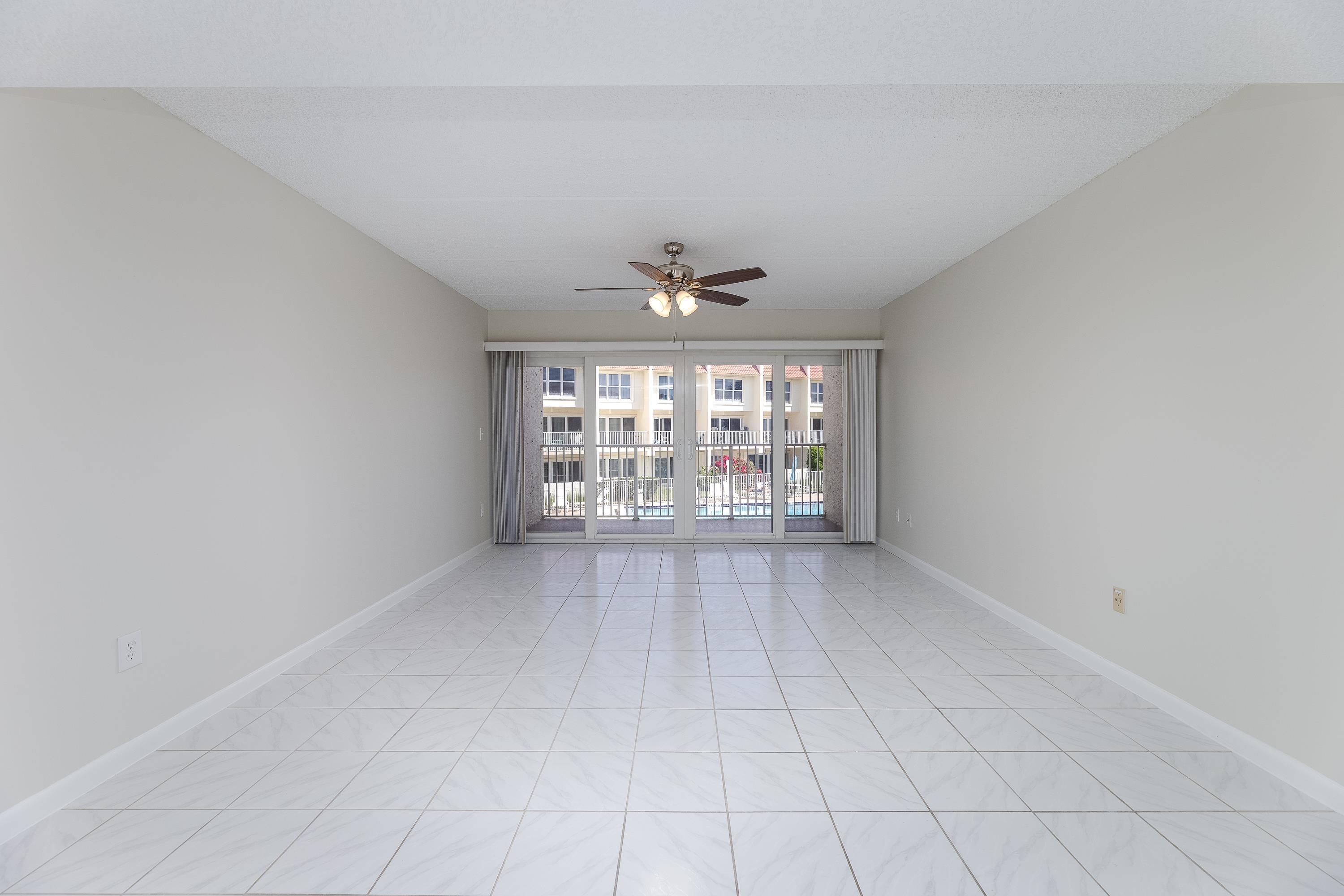 390 A1A Beach Boulevard, Unit 48 St. Augustine, FL 32080 - Photo 6 of 24 a view of an empty room with a window