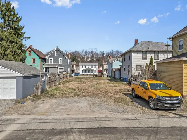 a car parked in front of a house