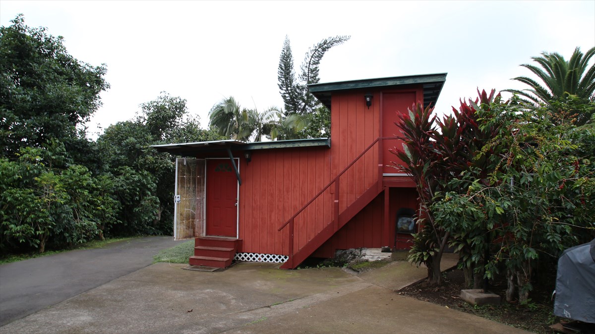 82-1213 Greenwell Mountain Road Captain Cook, HI 96704 - Photo 5 of 5 a small garden covered with tall trees