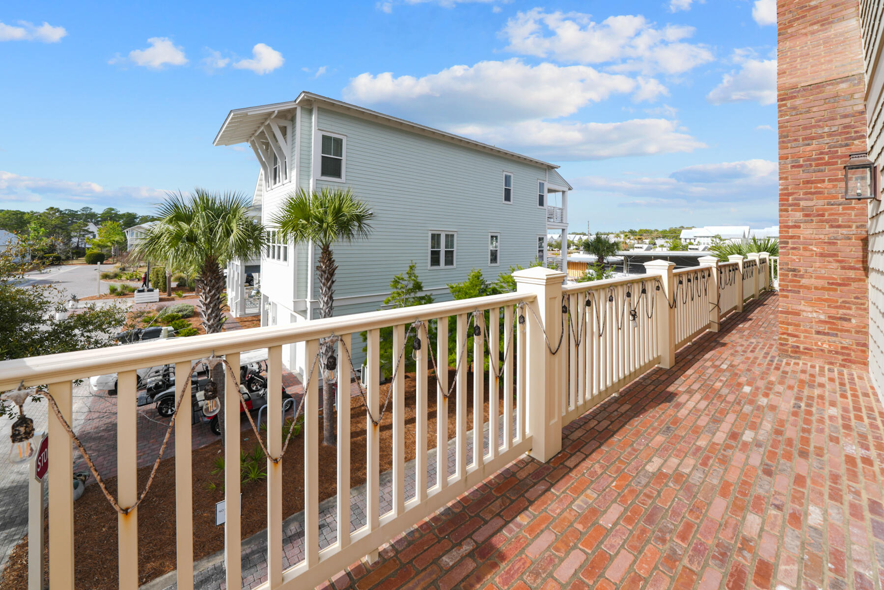 29 Pleasant Street, Unit 1 Inlet Beach, FL 32461 - Photo 30 of 66 a view of a balcony with wooden floor