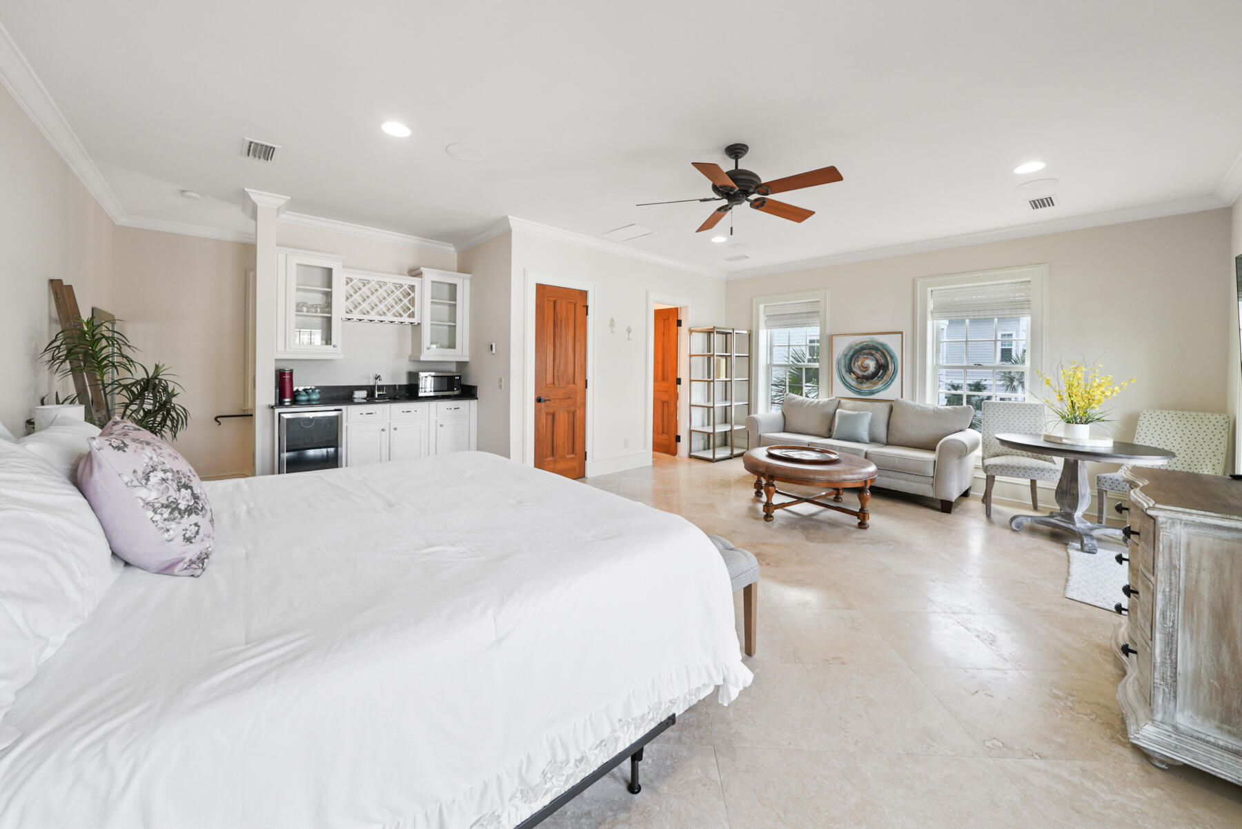 29 Pleasant Street, Unit 1 Inlet Beach, FL 32461 - Photo 48 of 66 a bedroom with furniture and a chandelier