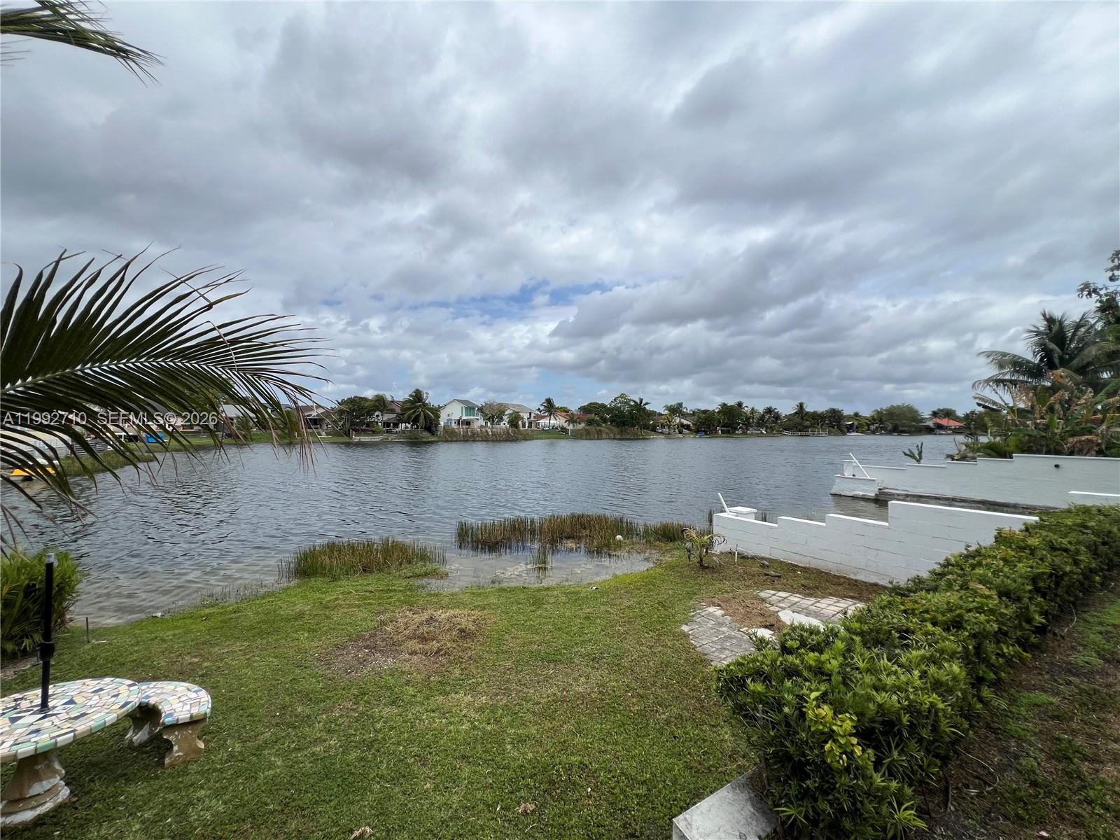 15511 Southwest 59th Street Miami, FL 33193 - Photo 32 of 34 a view of a lake from a yard