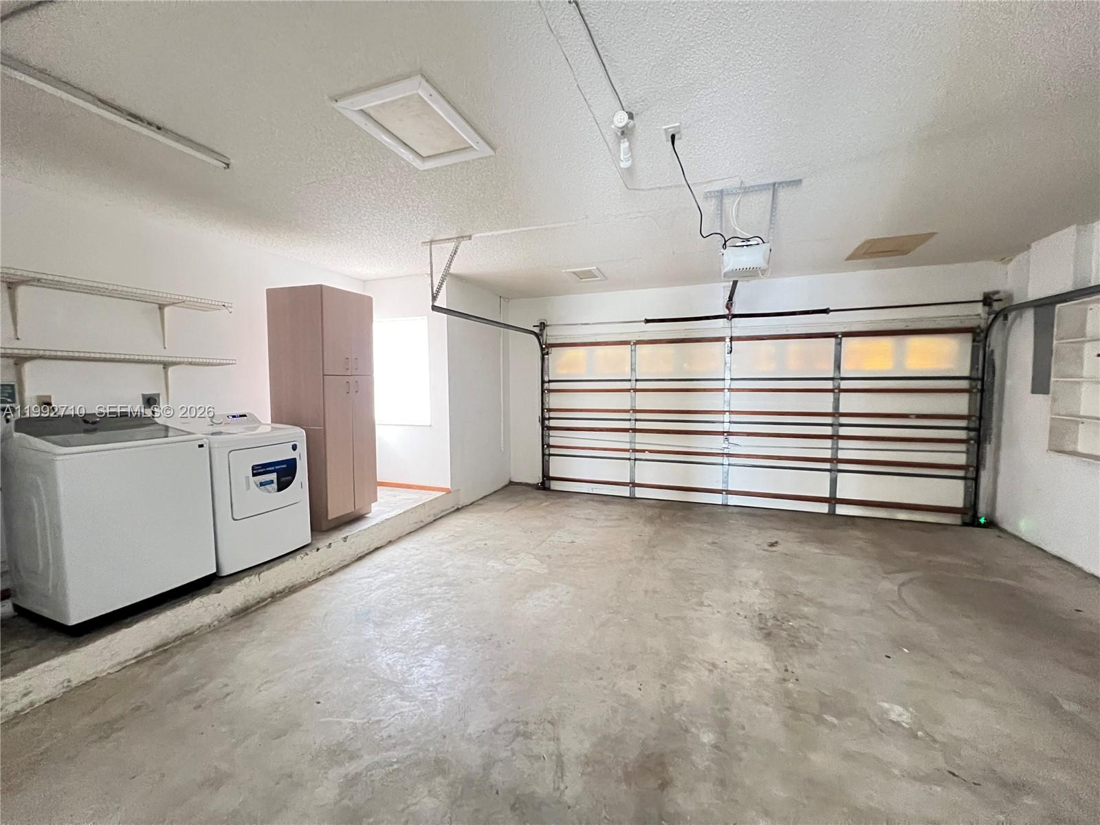 15511 Southwest 59th Street Miami, FL 33193 - Photo 33 of 34 a view of a garage with furniture
