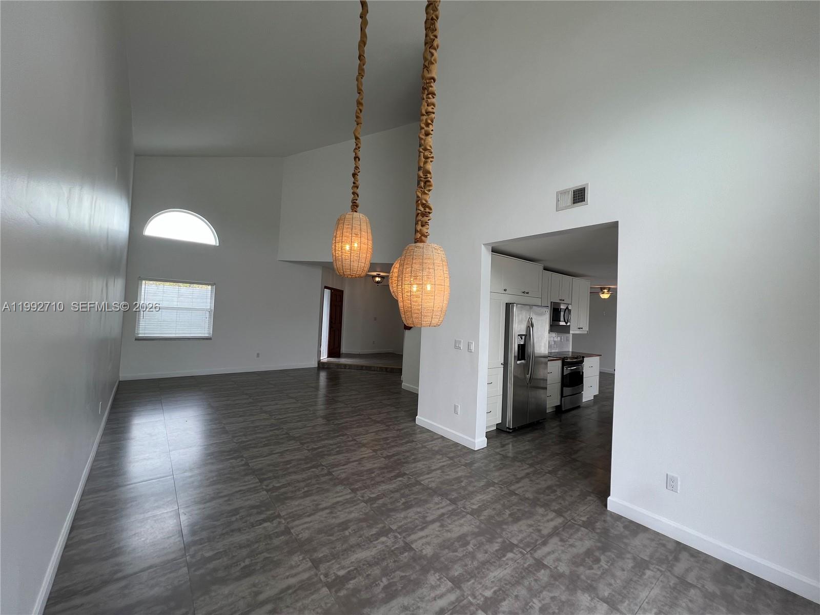 15511 Southwest 59th Street Miami, FL 33193 - Photo 10 of 34 a view of a livingroom with a furniture