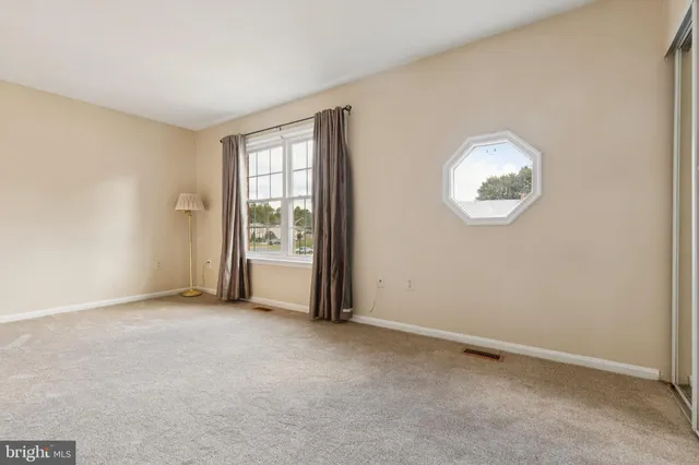 an empty room with window