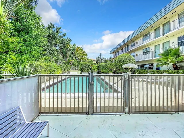 a view of a brick building from a roof deck