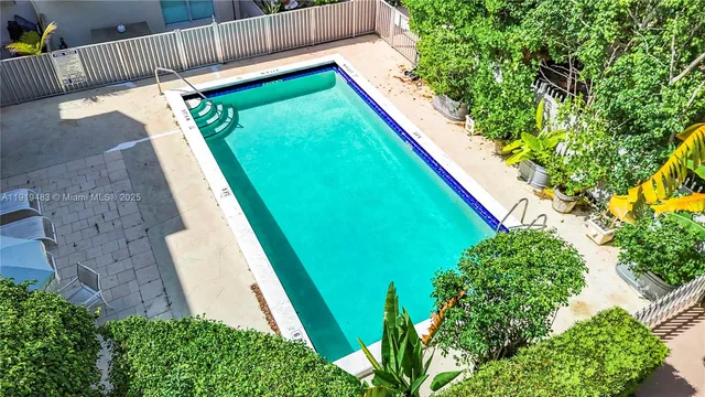 a view of a backyard with plants