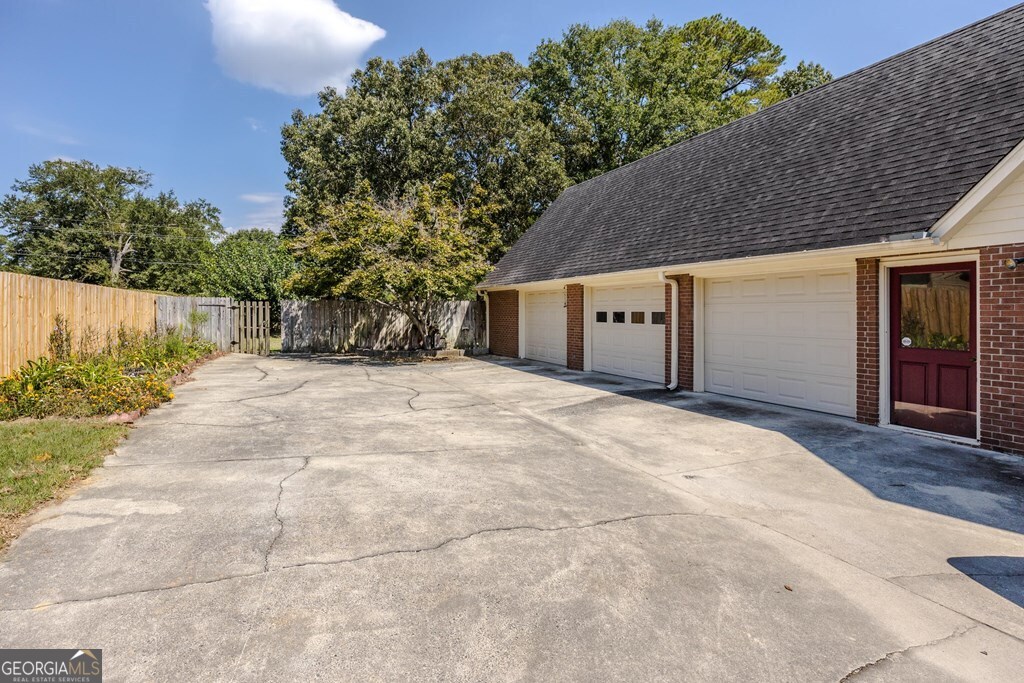 206 Ridge Circle Dublin, GA 31021 - Photo 23 of 23 a view of a house with a yard