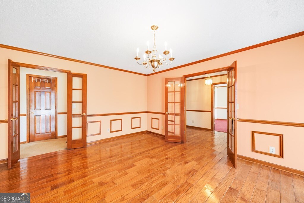 206 Ridge Circle Dublin, GA 31021 - Photo 4 of 23 a view of an entryway with wooden floor