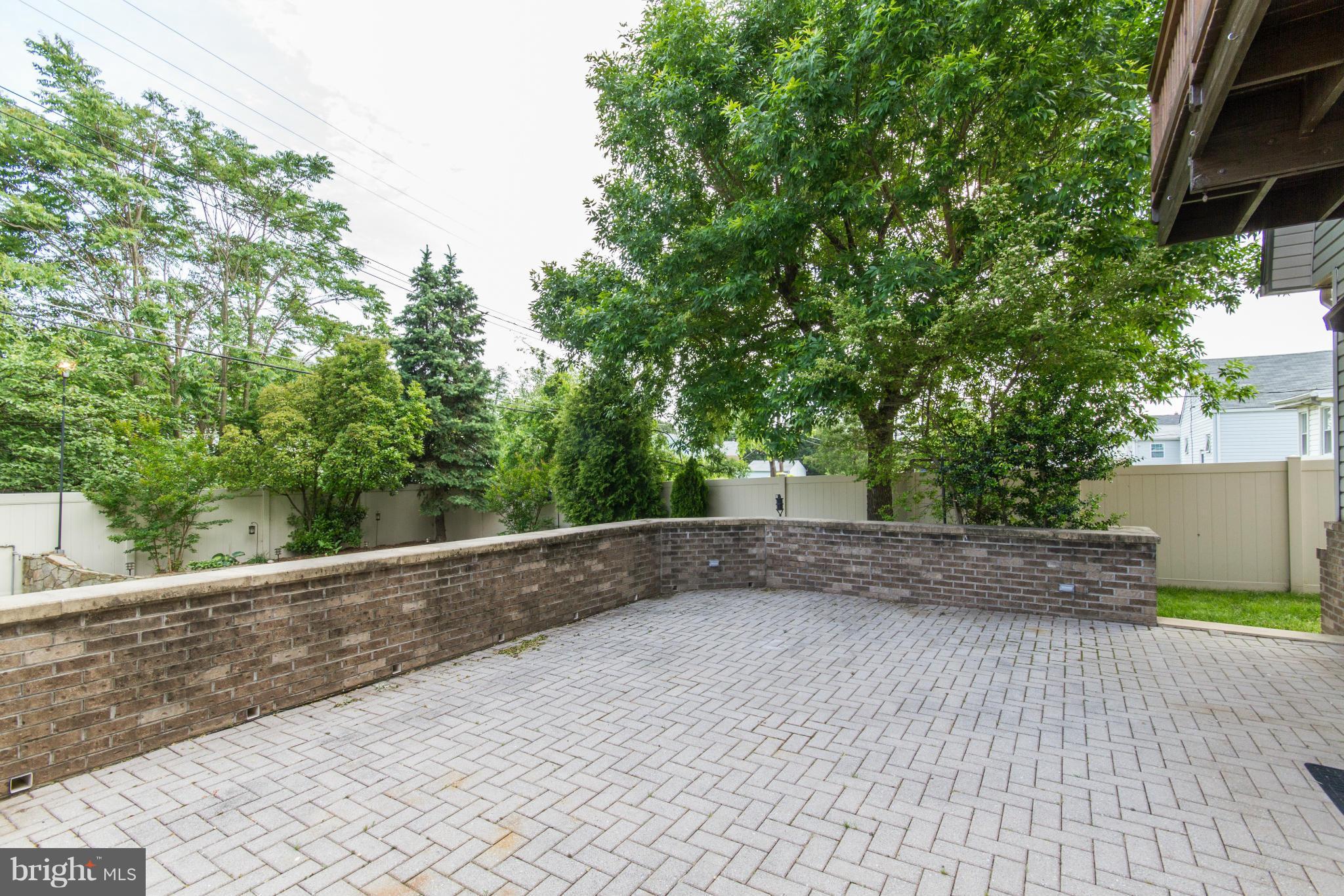 300 Pinewood Road Baltimore, MD 21222 - Photo 22 of 24 Patio w/ Stone Retaining Walls